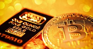 Prezzo dell'oro indebolito da Bitcoin
